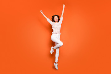 Wall Mural - full length photo of ecstatic girl jump have fun win spring time lottery raise fists wear casual sty