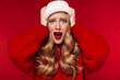 © Drobot Dean - Screaming caucasian woman wearing christmas hat.