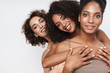 © Drobot Dean - Portrait of attractive multiethnic women smiling and hugging together