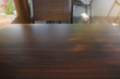 © weerawat - Wooden table in the cafe. Blurred background.