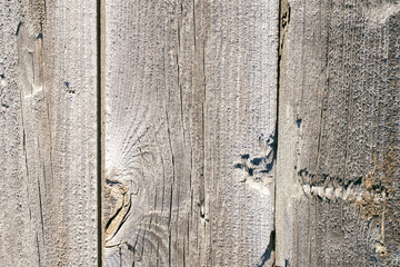 Texture of old wooden boards with cracked surface.