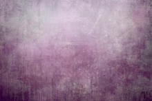 Splattered Purple Paint On A Canvas