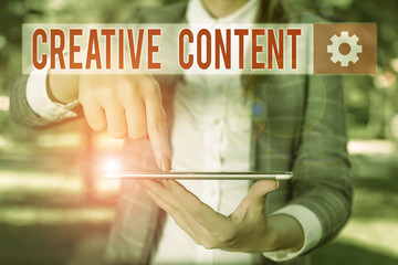 Poster - Handwriting text writing Creative Content. Conceptual photo providing showing with the type of content they re craving Outdoor scene with business woman holds lap top with touch screen