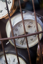 Old School Retro Vintage Alarm Clocks Tracking Time Trapped In A Bird Cage Rusty Metal Iron Nice Soft Shadows Slow Dying Feeling Vibe Historical Objects Hidden Clock Prison Locked Away Chernobyl