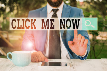 Poster - Text sign showing Click Me Now. Business photo text Internet helping desk Press the button Online Icon Nertwork Businessman with pointing finger in front of him