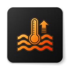 Poster - orange glowing neon water thermometer measuring heat and cold icon isolated on white background. the