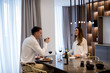 © BGStock72 - Sweet couple having a romantic dinner at luxury kitchen