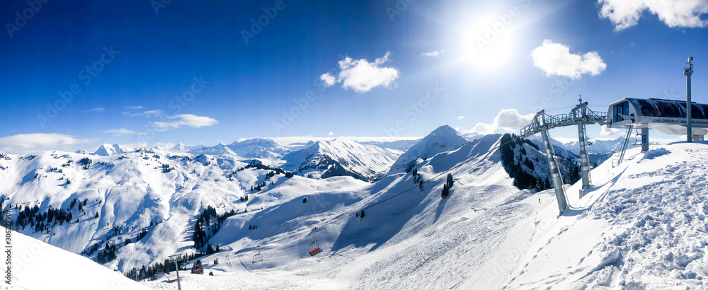chairlift in front of switerland alps mountain range panorama with blue sky - obrazy, fototapety, plakaty 