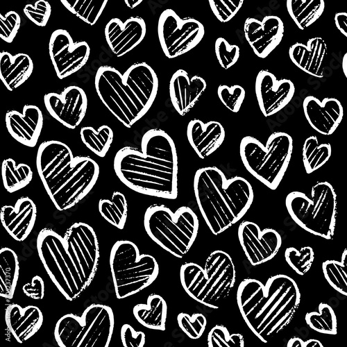 Romantic seamless pattern with cute images of hearts on a black background. C...