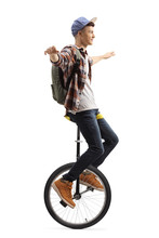 Full Length Shot Of A Male Student Riding A Unicycle
