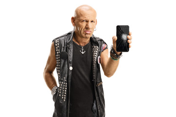 Canvas Print - Sad punk holding his broken mobile phone