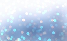 Winter Glitter Blue Blurred Background. Christmas Bokeh Texture. New Year Glare Template. Magical Shimmer Pattern.