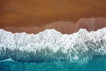 Sticker - ocean wave on a sandy beach