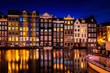 Damrak Amsterdam at twilight