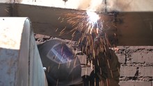 Metal Cutting By Welding Machine. Sparks Fly