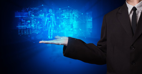 Aufkleber - Young person holding hologram projection displaying health related graphs and symbols