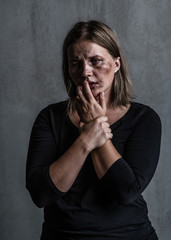 Wall Mural - Thoughtful woman victim of domestic violence and abuse