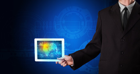 Poster - Hand holding tablet with global database concept