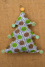 Handmade Green Pattern  Textile Cotton Fabric Naive Retro Style Christmas Tree Ornament Decorated With Beads On Burlap Background