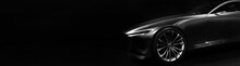 Silhouette Of Black Sports Car With One LED Headlights On Black Background,copy Space