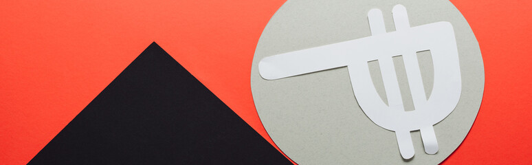 Poster - panoramic shot of paper cut peso symbol in grey circle on black and red background