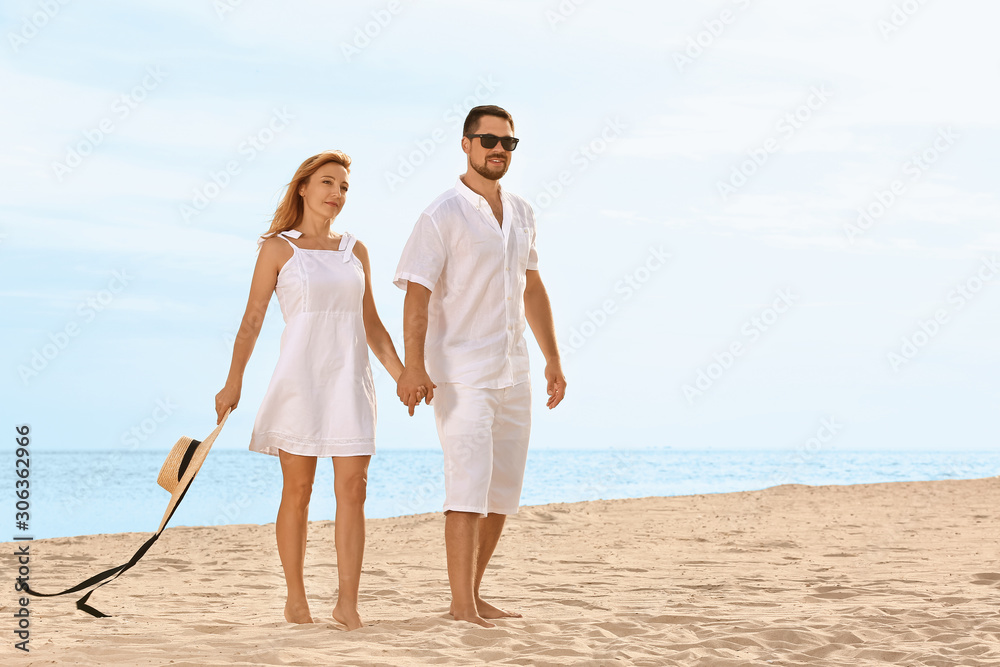 Happy couple resting at sea resort