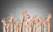 © adam121 - Row of man hands showing okay gesture