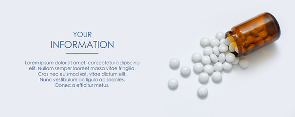 Wall Mural - Pills spilled out of a glass jar. Medical conception. First Aid Kit. Web article template. Long header banner format. Sale coupon. Visit card. Your information. Text space.