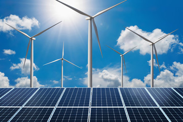 Wall Mural - concept clean energy power. solar panel with wind turbine and blue sky background