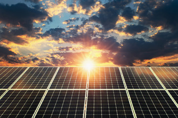 Wall Mural - solar panel sunset. concept clean energy, electric alternative, power in nature