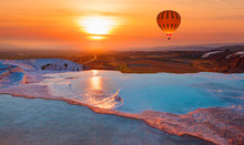 Hot Air Balloon Flying Over Spectacular Pamukkale - Natural Travertine Pools And Terraces In Pamukkale. Cotton Castle In Southwestern Turkey,