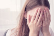 © Анастасия Семашко - Girl crying and closes her face with her hands, close up, toned