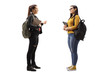 © Ljupco Smokovski - Two female students with books and backpacks having a conversation