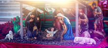 Traditional Christmas Scenes And Sacred Light Shining For Use In Illustration Design Nativity Scenes With Jesus Baby On The Manger With Carvings, Including Jesus, Mary, Joseph, Sheep And Magi