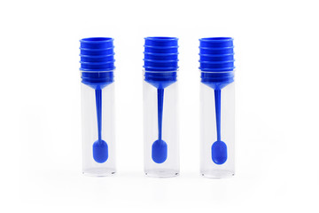Wall Mural - three empty transparent stool sample test tubes with blue lid isolated on white background