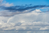 Fototapeta Niebo - white and grey clouds in a blue sky