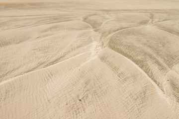 Beige sand textural background