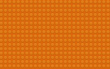 Orange Plastic Construction Plate. Perfect Illustration Background Of Closeup Gloss Plastic Construction Block.