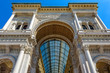 Entrance to Galleria Vittorio Emanuele II closeup, Milan, Italy. This gallery is luxury mall and famous tourist attraction of Milan.