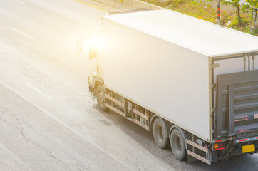 Truck transport, White truck on the highway.