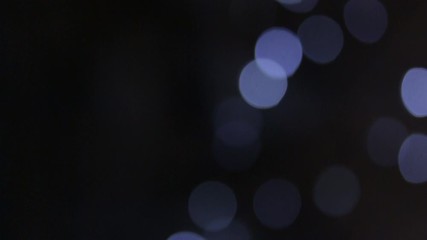 a group of blinking blurry white lights