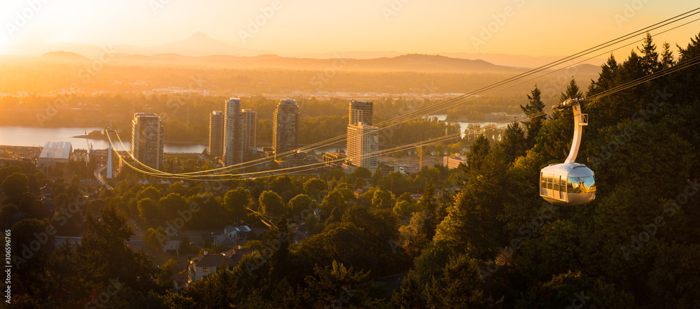 Cable car in Portland, Oregon, USA with wonderful view on sunrise with mt. Hood and aerial tram going to OHSU - obrazy, fototapety, plakaty 