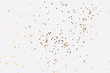 White background with golden glitter. Party concept.