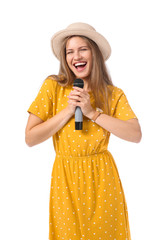 Poster - Beautiful young female singer with microphone on white background