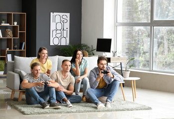 Sticker - Group of friends playing video games at home