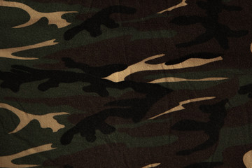 Wall Mural - Closeup of military uniform surface. Texture of fabric, close-up, military coloring