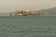 Alcatraz Prison During A Summer Day, View Of The Historic Site Of Alcatraz In San Francisco From The City Pier During A Summer Day. United States