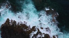 Ocean Waves Breaking Over Costal Rocks In Hawaii