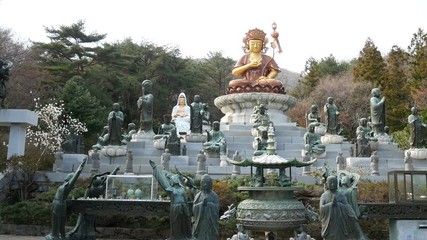 Wall Mural - Statues of  Buddha and other goddess at Beomeosa buddhist Temple in Busan, South Korea.