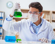 © Elnur - Male doctor working in the lab on virus vaccine